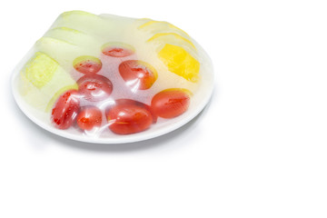 fruits which are wrapped with plastic film preservation, isolated white background copy space 