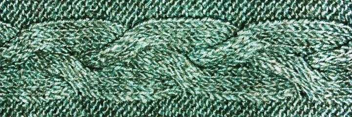 Blue knitwear fabric with pigtail, knitted wool texture of gray jersey.