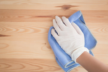 woman cleaner cleaning living room in apartment. portrait of asian woman cleaning staff doing...
