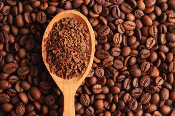 instant coffee in a spoon and coffee beans. Coffee, coffee drinks.