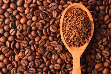 instant coffee in a spoon and coffee beans. Coffee, coffee drinks.