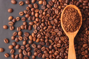 instant coffee in a spoon and coffee beans. Coffee, coffee drinks.