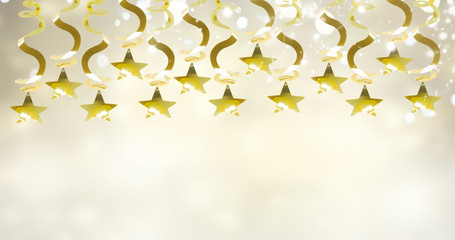 golden garland with stars on festive gray background with copy space