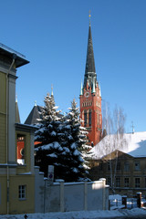 Obraz premium Altenburg / Germany: Wintry view to the steeple of the Church of the Brothers in the former residence city