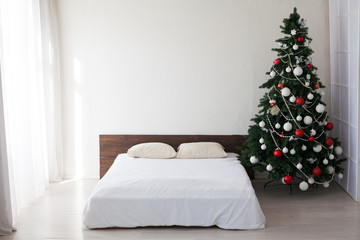 Christmas Decor bedroom with a new year tree holiday gifts