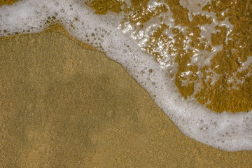 Water on the sand.
