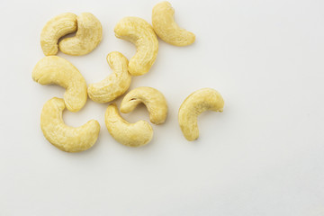 raw cashew nuts isolated on white background.