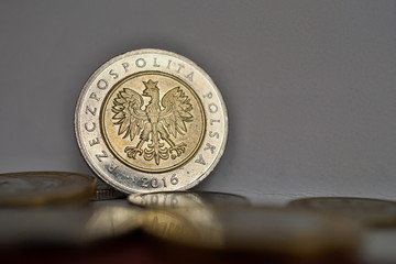 Set of Polish coins (Zloty, PLN) in silver and gold colors as a symbol of currency in Poland 