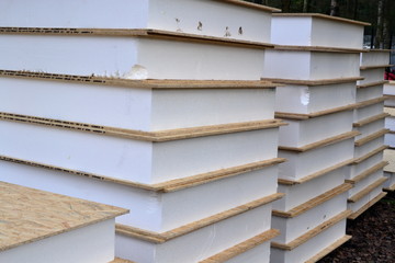 Insulated panels for building a house.