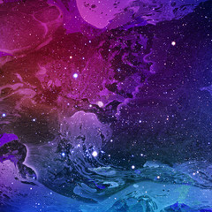 Colorful abstract space background on watercolor paper. Marble ink nebula image. Hand painted cosmos and stars.