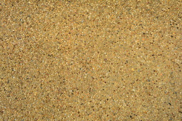 the background from the old cement wall topping with washed sand