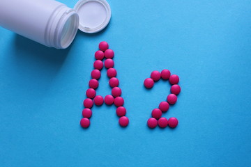 the letter A 2 is lined with pills