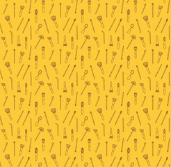 Seamless pattern of cosmetics brushes vector illustration sketch colored yellow brown