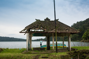 Fototapeta na wymiar An ancient pavilion near a lake in Mount Putuo zhoushan city zhejiang province China.