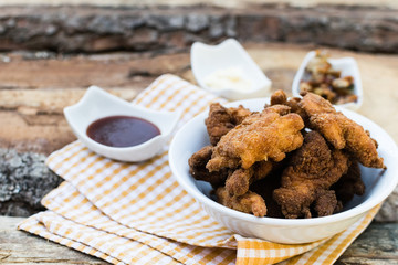 Breaded chicken breast with barbecue sauce and mayonnaise