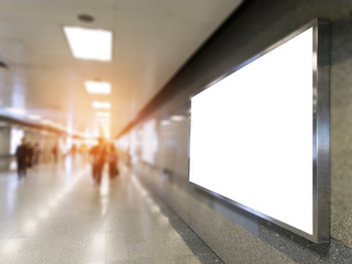 billboard big blank white LED screen perspective horizontal outstanding in subway side pathway people walking to train underground for display advertisement text template promotion new brand indoor.