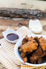 Breaded chicken breast with barbecue sauce and mayonnaise