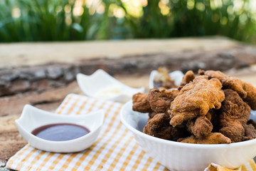 Breaded chicken breast with barbecue sauce and mayonnaise