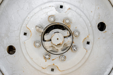 Disk tire sewed large truck tractor parts car fuel oil soot rust old snow cleaner bolts nuts piston silver