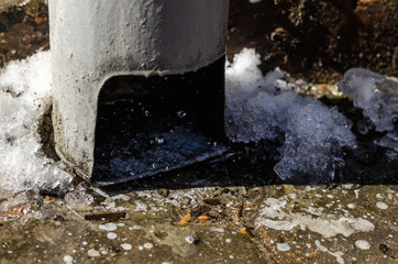 Tube leaking pipe old rusty drops snow rain leaks communally service