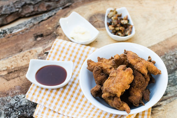 Breaded chicken breast with barbecue sauce and mayonnaise