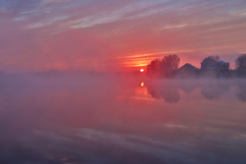 Beautiful foggy morning at the lake