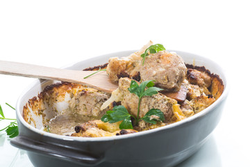 Cauliflower baked with meatballs in cheese sauce