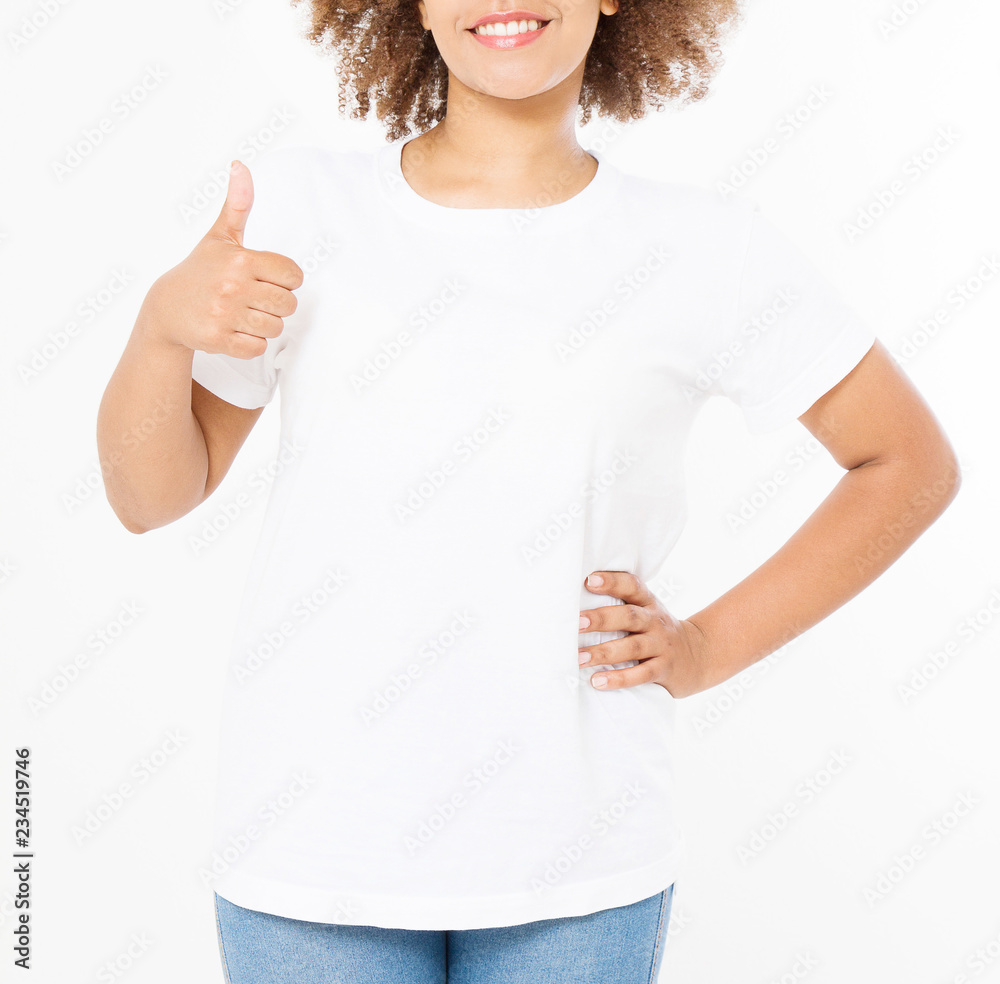 Wall mural Summer t shirt design and people concept close up of young afro american woman in blank template white t-shirt. Mock up. Copy space. Curly hair. front view. Cropped image