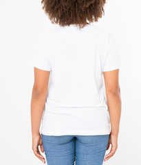 Summer t shirt design and people concept close up of young afro american woman in blank template white t-shirt. Mock up. Copy space. Curly hair. Back rear view.