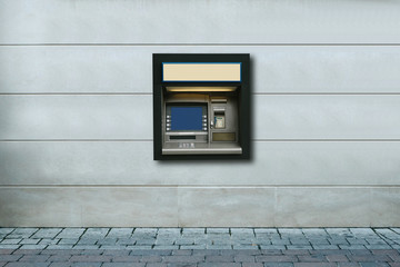 Modern street ATM machine for withdrawal of money and other financial transactions.