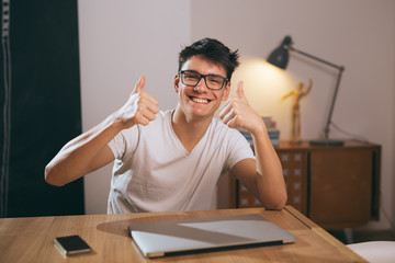 happy teenage boy posing