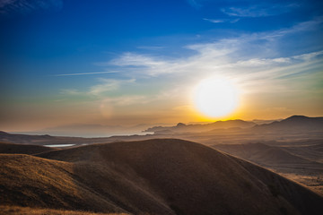 Fototapeta na wymiar Crimean mountains on the background of the setting sun