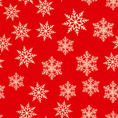 Seamless pattern with falling snowflakes. Vector