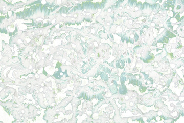 Colorful wet abstract paint leaks and splashes texture on white watercolor paper background. Natural organic shapes and design.