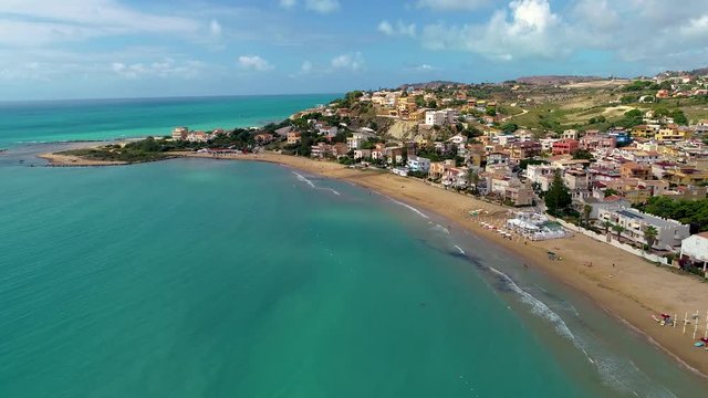 Aerial. Public beach near The Scala dei Turchi. Realmonte, near Porto Empedocle, southern Sicily, Italy.