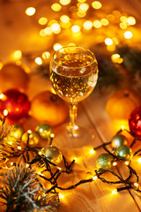 Christmas drinks on table. Christmas  decorations with lights background. Happy New Year! Christmas greeting card. Winter card template. Xmas concept. Holiday Banner. Feast of Nativity. 