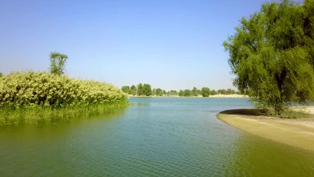 Al Qudra lakes with greens