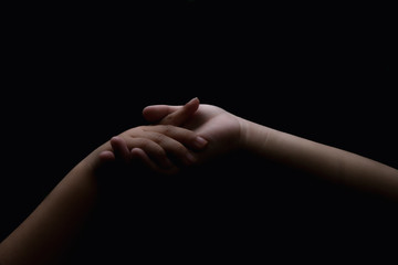 Close up of children hand holding together. Lovers couple holding hands. friendship  concept (Soft focus with film grain)