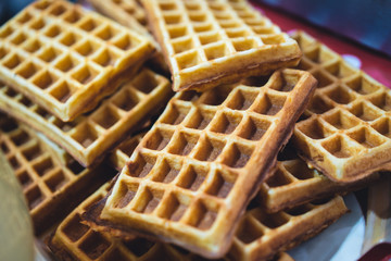 Delicious Belgian waffles with fruits and marshmallows