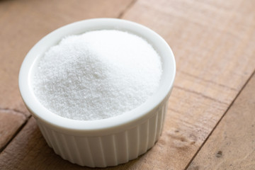 Fototapeta na wymiar Close up on a ramekin dish of granulated sugar