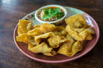 Thai fried Dumplings.Thai Style Fried Wonton served with spicy sauce