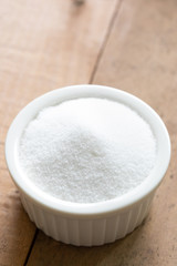 Ramekin dish of granulated sugar with space for text