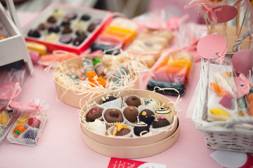 beautifully decorated table with sweet candy bar