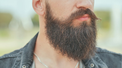 Fototapeta premium Close-up of the beard of a brutal man.