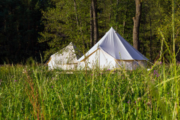 Camping canvas bell tents outdoors