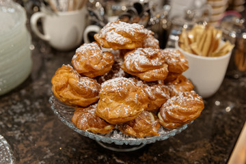 Cream puffs on bakery display