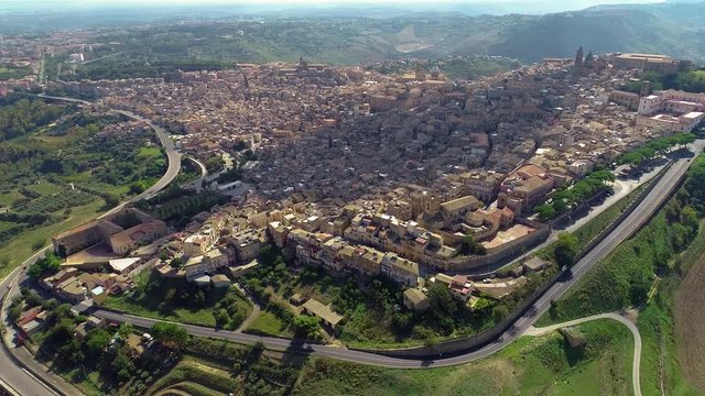Aerial. Caltagirone  is a town and commune in the Metropolitan City of Catania, on the island of Sicily, southern Italy.