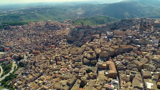 Aerial. Caltagirone  is a town and commune in the Metropolitan City of Catania, on the island of Sicily, southern Italy.