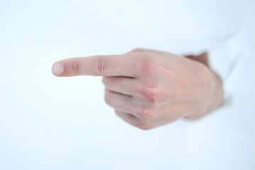 man's hand breaking through the paper wall and pointing at you