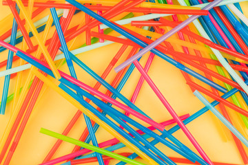 Drinking straws for colored background. Colorful plastic straws used for drinking water or soft drinks.